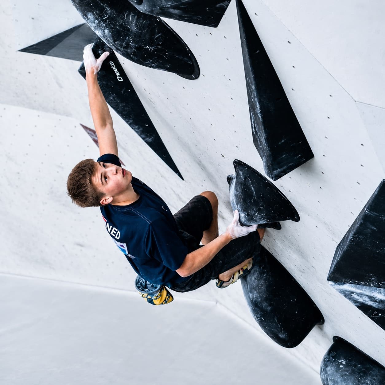 Competing in the boulder final at the World Youth Championships in Innsbruck